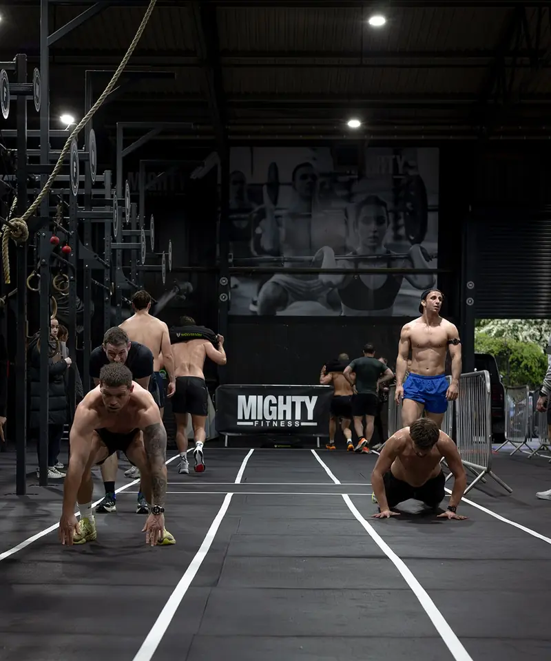 Members working through a hybrid training circuit on the marked lanes at Mighty Fitness, Durham