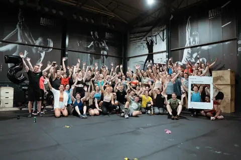 Mighty Fitness members celebrating together after a session